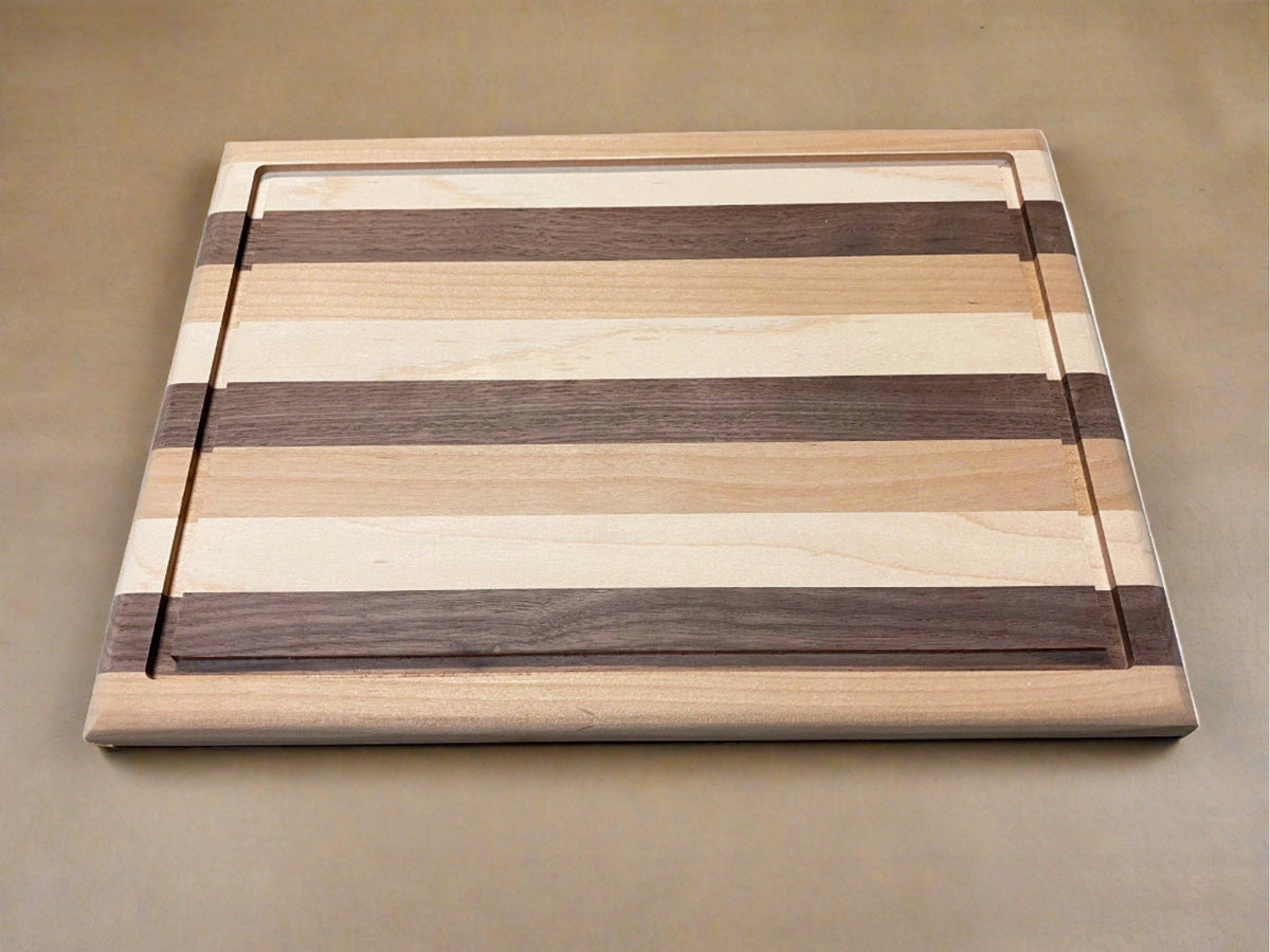 Modern Mix of Alder, Walnut and Maple Side grain Cutting Board